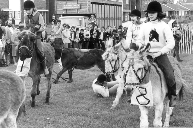 A photograph of a Donkey Derby organised by the Lions Club which took place on the Smawthorne Recreation Ground, Castleford, possibly in the 1970s