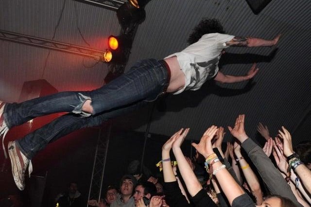 Matt Bowman, lead singer of The Pigeon Detectives, tries crowd surfing.