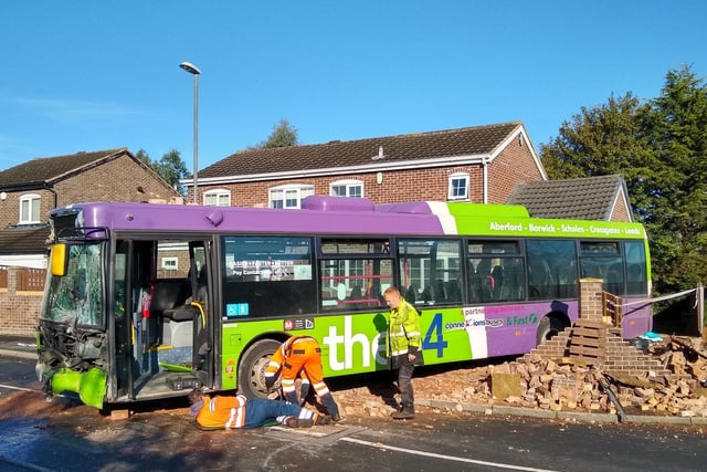 The bus went into the house backwards, but the front of the vehicle was also badly damaged.