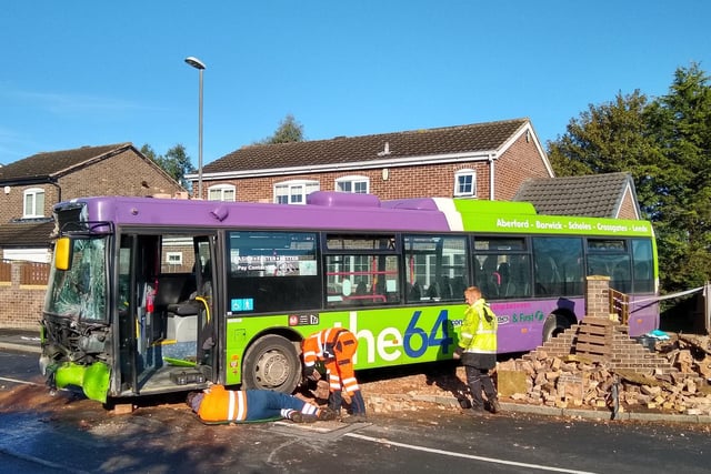 The Aberford to Leeds service crashed through a wall and hit the garage on the end of the house.