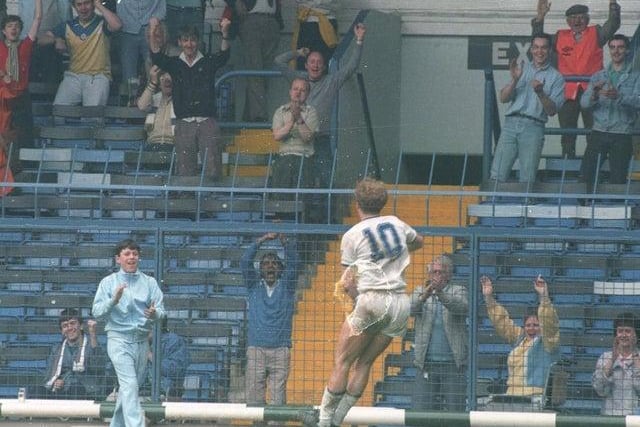 Ian Baird celebrates scoring with a ball boy at Elland Road as the Whites beat Birmingham City 4-0 in April 1987.