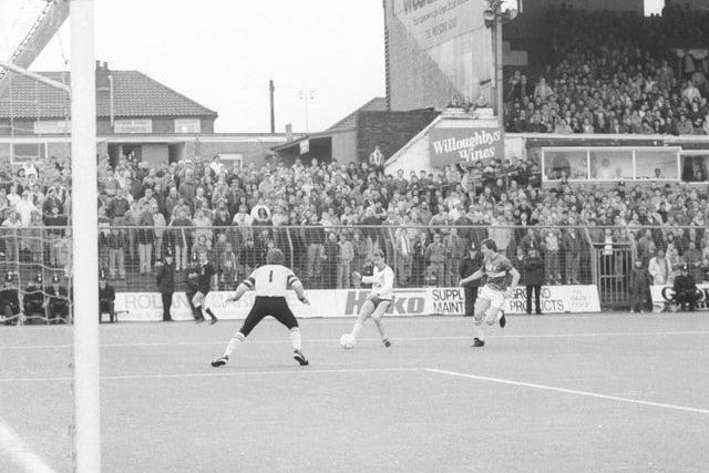 John Sheridan fires towards goal at Boundary Park in the play off semi-final second leg. A Keith Edwards strike meant the Whites went through on away goals rule.