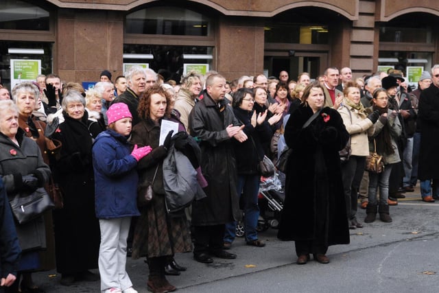 The crowd applaude at the end of the parade after the Remembrance Service at Harrogate war memorial in 2008.