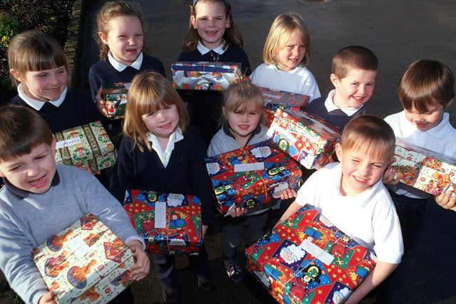 Pupils at Middleton Primary School with some of the shoeboxes theyfilled for the Yorkshire Evening Post appeal for Children in Distress.