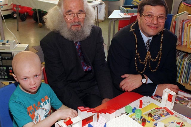 Street singer Danny Freeman (centre) visits the new children ward at St James's Hospital where his £40,000 raised over three years will be spent to help improve facilities. Also pictured is patient Luke Bottomley, six, and deputy Lord Mayor Mark Harris.