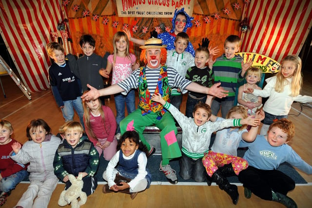 Clowns Tomato (centre) and Fizzy Pop with children at the Sandow Clowns Circus Party show, at Scalby Parish Hall.