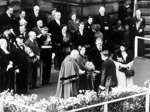 Her Majesty Queen Elizabeth II and Prince Philip are seen outside Morley Town Hall in which they enjoyed coffee for 20 minutes.