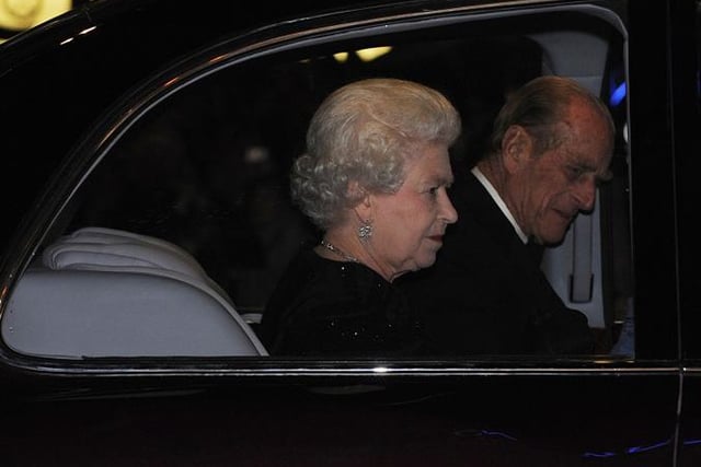 Queen Elizabeth II arrives with the Duke of Edinburgh for the 2009 Royal Variety Performance at The Opera House in Blackpool