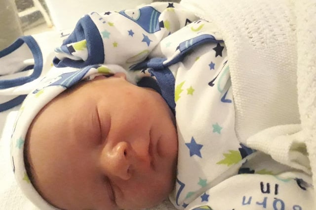 Baby Lok Joseph George Robinson, born 20th October, weighing 7lb 2oz, to parents Lindsey Robinson and Stuart Gibson.