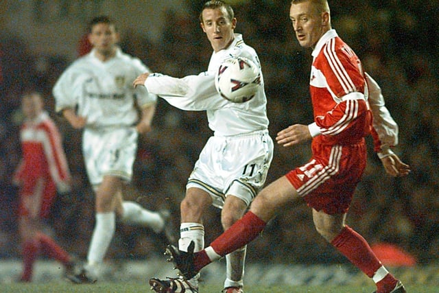 Lee Bowyer puts the ball into the box past Spartak captain Andrei Tikhonov.