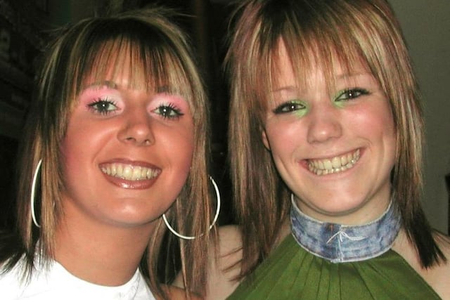 Smiles for the camera on a night out in 2004.