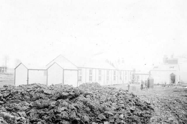 Undated. The New Manston Hall estate was purchased from Edward Waud. A smallpox hospital was built on the site opening in 1898. Building continued until 1904. This view shows some of the early buildings.