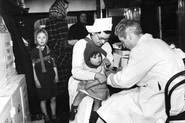 February 1942 and an immunisation programme is in full flow. Location unknown.