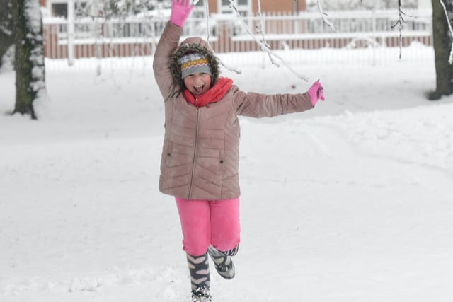 Jasmine Goodfall, aged seven, had fun in the snow in Manston Park, Cross Gates in Leeds.