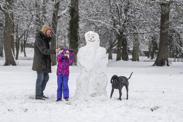Noa Acaster Clarke and her dad, Aiden, built a snowman in Horsforth Hall Park
