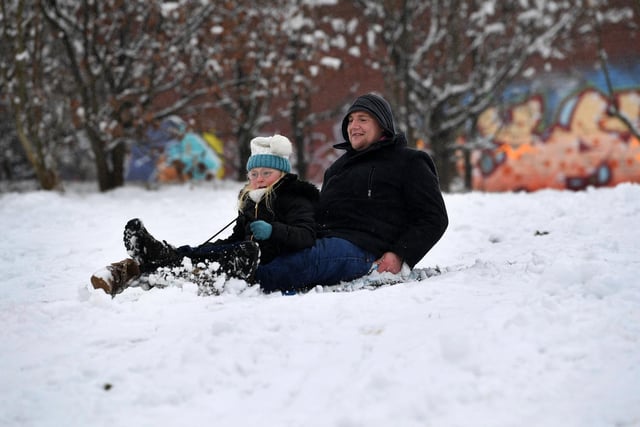 Nine-year-old Avah Walker and her dad Stephen have been out sledging in Beeston, Leeds.