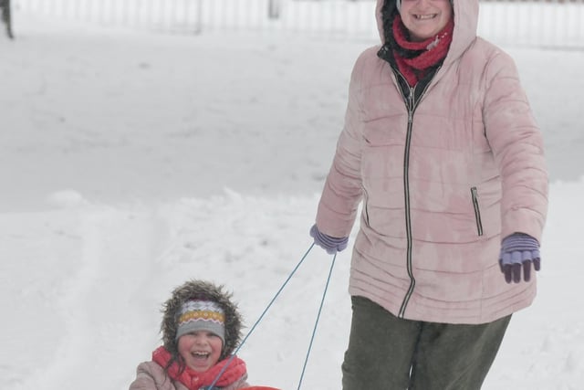 Mum Sarah gave seven-year-old daughter Jasmine Goodfall a sledge ride in Manston Park, Cross Gates in Leeds.
