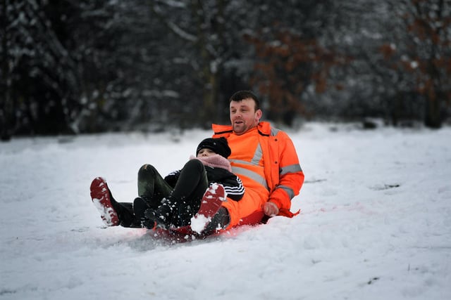 10-year-old Tia-Leigh Binghamand her dad Dale have been sledging in Beeston, Leeds.