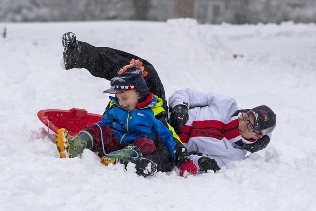 Simon Clayton and son Zak went sledging in Farsley this morning