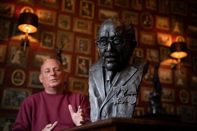 Garry McBride of Monumental Icons with a bronze bust of Captain Sir Tom Moore, which has been commissioned by the Derbyshire firm and sculpted by Andrew Edwards in the hope it can be displayed at the headquarters of NHS Charities Together, the charity the centenarian raised money for