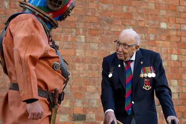 Captain Sir Tom Moore in Wootton, Marston Moretaine, Bedford with veteran fundraiser Lloyd Scott, who will attempt to climb the Three Peaks whilst wearing a deep sea diving suit