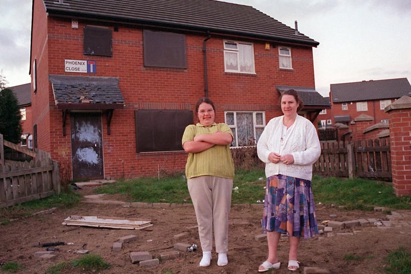 Residents on Phoenix Close were unhappy about crime rates in the area. Pictured 
is Sharon Bishop and daughter Emma by one of the boarded up houses.