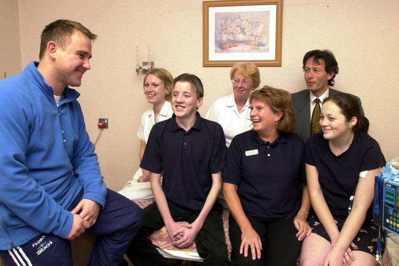 November 2001 and Leeds United physio Dave Hancock returned to his former workplace - the Cystic Fibrosis Unit at Seacroft Hospital to present them with a cheque for £20,000 that he raised from running the London Marathon