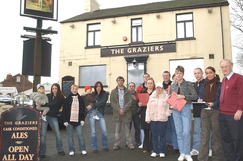 Simone Roche and other regulars with Norman Hazell signing a petition at the doomed Graziers pub on Doncaster Road, Wakefield.