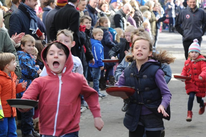 A tiny youngster taking part in one of the many the pancake races from Ripon Cathedral on Shrove Tuesday back in 2015.