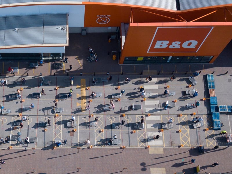 This amazing shot of socially distanced shoppers outside B&Q was captured by SWNS news agency