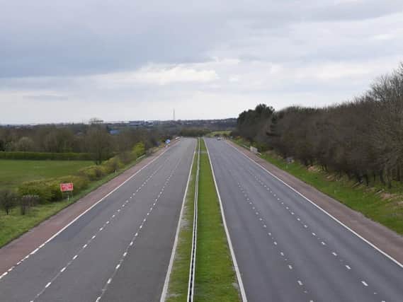 The M55 motorway, looking towards Blackpool, empty on a Saturday midday due to the coronavirus social distancing measures