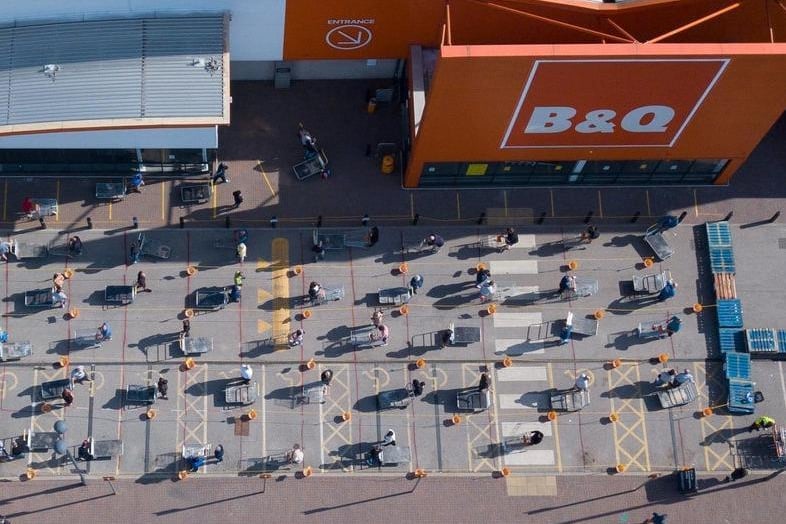 This amazing shot of socially distanced shoppers outside B&Q was captured by SWNS news agency
cc SWNS