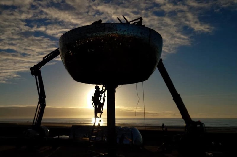 The mirror ball on Blackpool Promenade is taken down to be refurbished