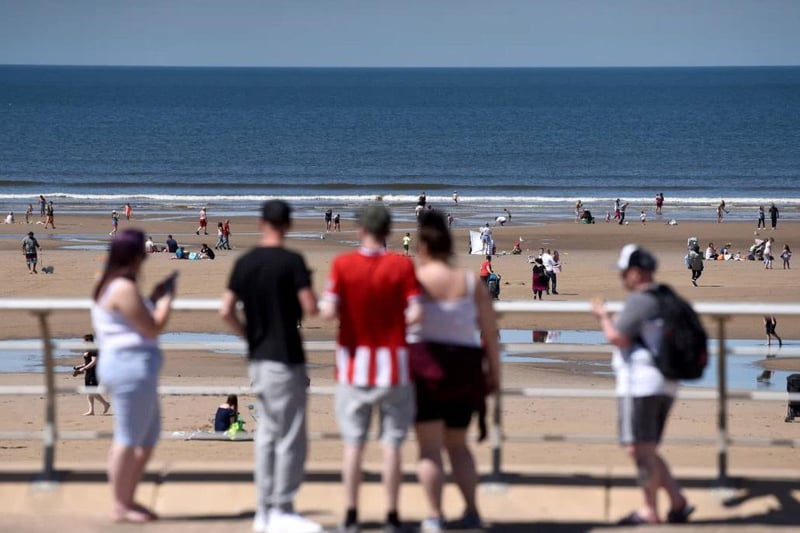 Holidaymakers flock to Blackpool beach on a sunny day in May 2020