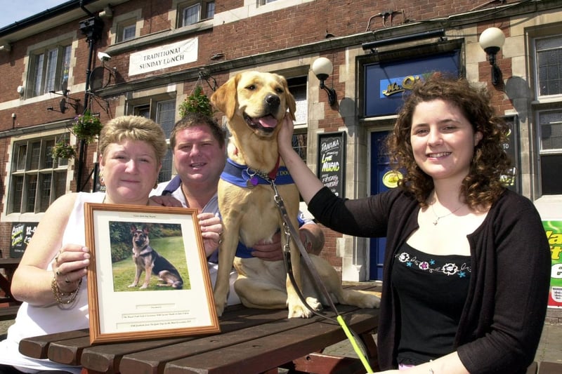 July 2001 and landlords of the Royal Park, Lynn and Gary Barrass are pictured with Tish Kennor, fundraising development officer for Guide Dogs for the Blind and Dulcie. Pub regulars raised £1,000 to help sponsor a new guide dog.