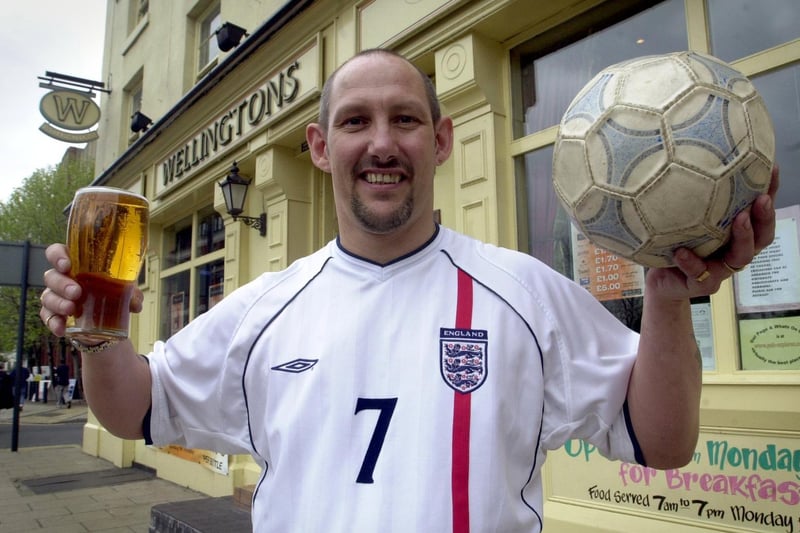 This is Alan Hart, landlord of Wellingtons on Wellington Street in May 2002. He was celebrating after being granted a license to show 2002 World Cup matches.