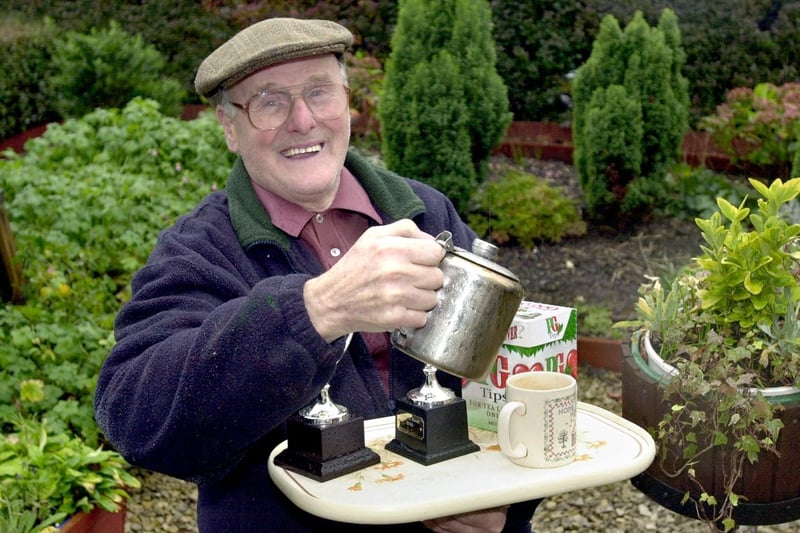 This is Harry Sheard who was enjoyed a well earned cup of tea among the shrubs in his Beeston garden after winning a clutch of gardening awards.