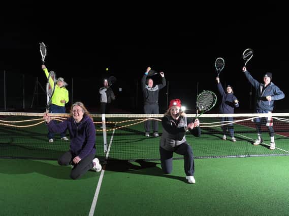 Withnell Fold Tennis Club mark the easing of restrictions with a midnight game.