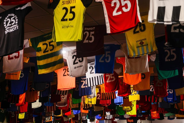 After receiving an astonishing number of jerseys from around the world, each and every one of them was hung from the ceiling above well-wishers at today's service.