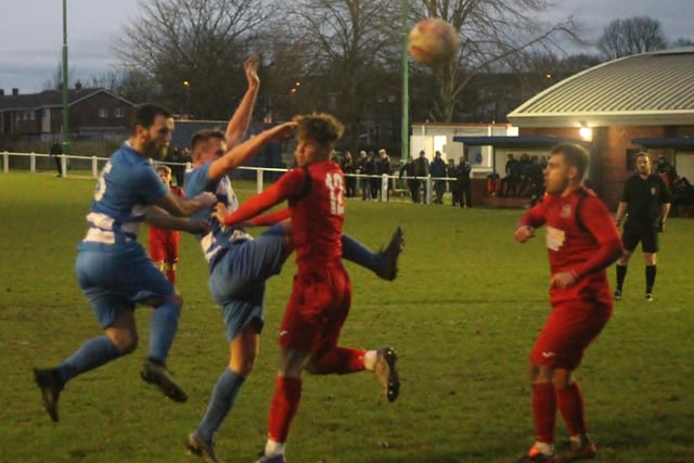 Jamie Simpson heads in Glasshoughton Welfare's goal against Worsborough Bridge Athletic.  Picture: Keith  A Handley