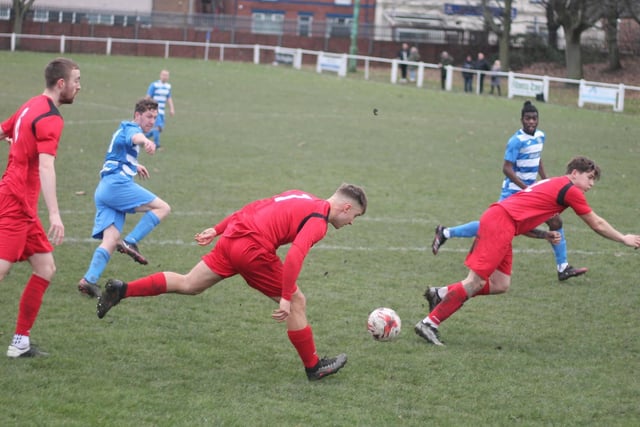 Desperate defenders cannot stop Glasshoughton Welfare getting a shot in. Picture: Keith  A Handley