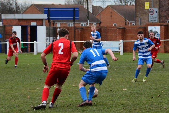 Jordan Chippendale takes on Worsbrough Bridge Athletic's right-back. Picture: Rob Hare