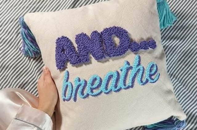 Stitching for mindfulness with Take it Slow Punch Needle Cushion by Textiles by Saphia at: https://tinyurl.com/2p993spz