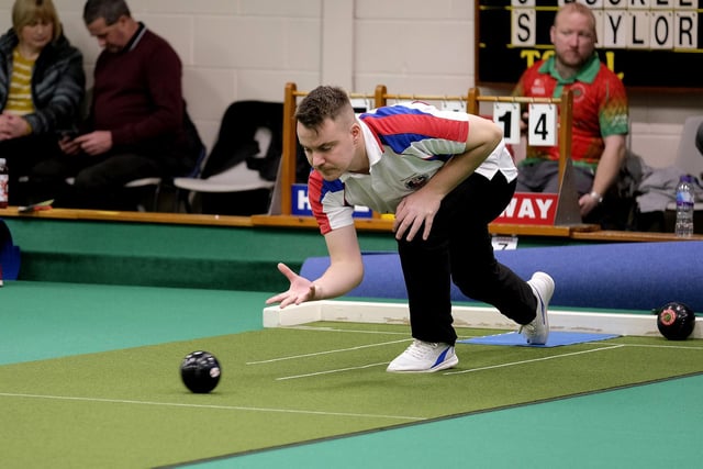 A bowler in action at the British Isles Short Mat Bowls Championship in Scarborough

Photos by Richard Ponter