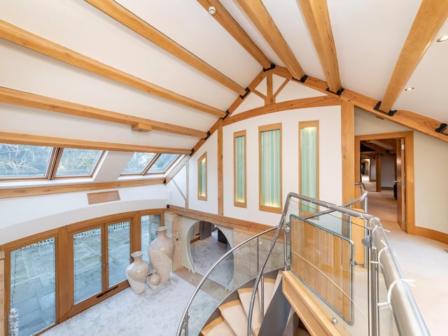 The first floor landing leads to the bedrooms and has far reaching views from the windows.