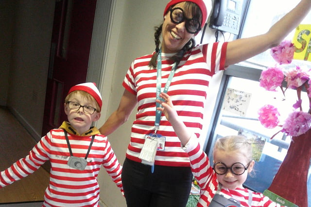 A member of staff and some children dressed up as Where's Wally from St John's Primary School, Knaresborough