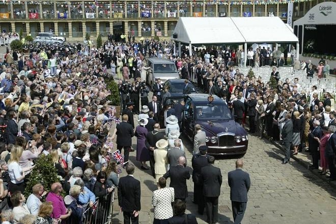Crowds waiting for the Queen and Prince Philip to arrive at The Piece Hall back in 2004.