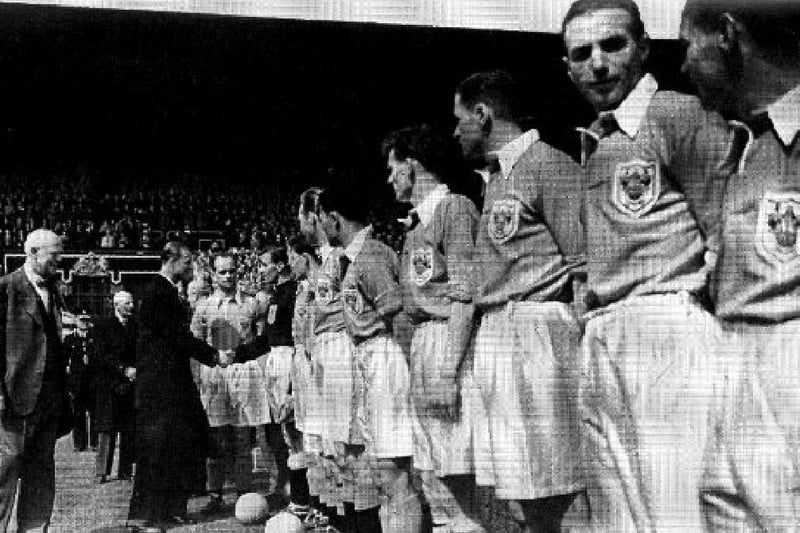 The Duke of Edinburgh meets the Blackpool Team during the  1953 FA Cup final between Blackpool and Bolton