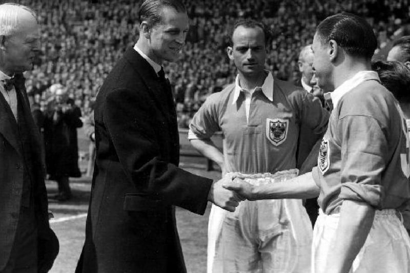 Harry Johnston presents his team to the Duke of Edinburgh during the 1953 cup final between Blackpool and Bolton