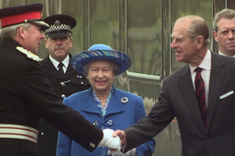 The Queen and Prince Philip are greeted by dignitaries at the unveiling of the Eric Morecambe statue in 1999.